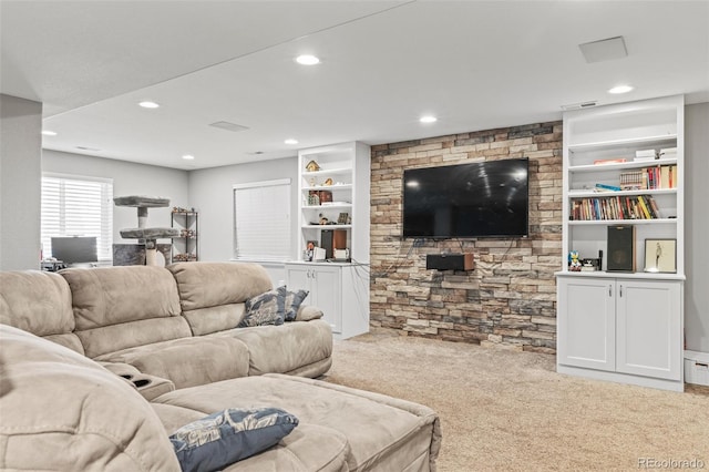15021 Josephine St, Thornton, CO 80602 - living area with carpet flooring, recessed lighting, and built in features