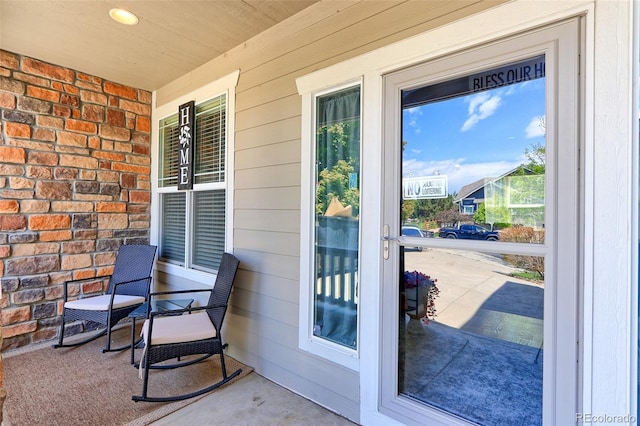 9994 Quintero St, Commerce City, CO 80022 - doorway featuring wood walls and brick wall