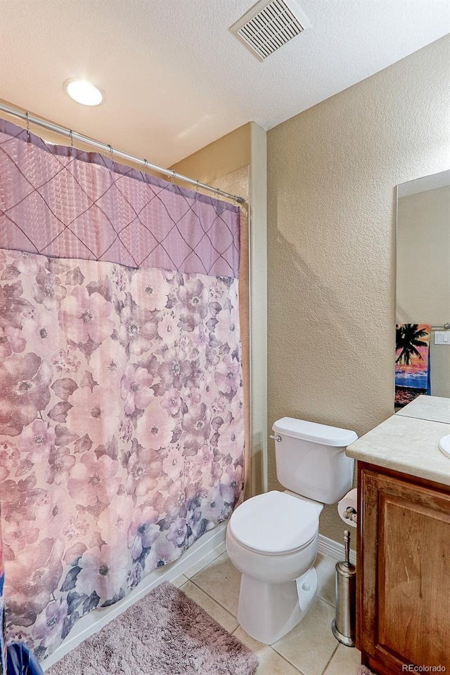 9994 Quintero St, Commerce City, CO 80022 - full bath featuring vanity, toilet, a shower with shower curtain, baseboards, and a textured wall