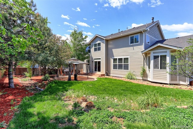 9994 Quintero St, Commerce City, CO 80022 - rear view of house featuring a gazebo and a patio