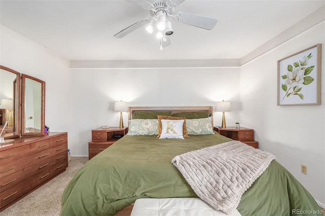 bedroom featuring ceiling fan and carpet floors