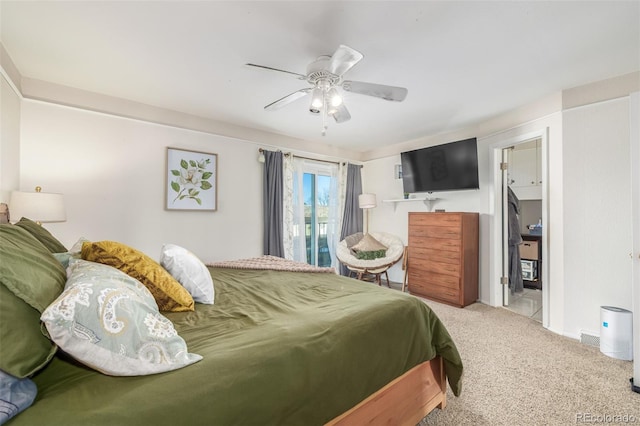 carpeted bedroom with a ceiling fan