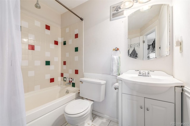 full bath with vanity, shower / bath combo with shower curtain, and toilet