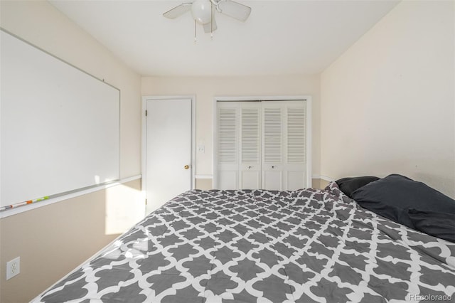 bedroom with a closet and a ceiling fan