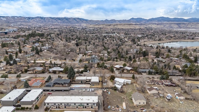 bird's eye view featuring a water and mountain view