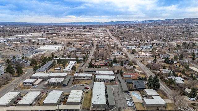 drone / aerial view featuring a mountain view