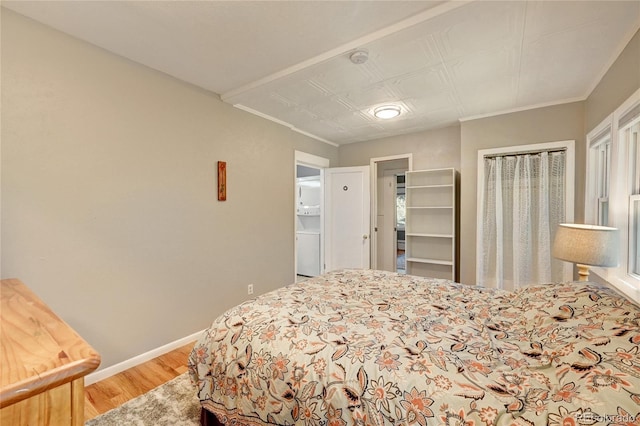 4642 Plettner Ln, Evergreen, CO 80439 - bedroom with wood finished floors and baseboards
