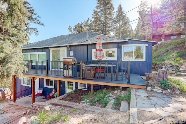 4642 Plettner Ln, Evergreen, CO 80439 - rear view of property with a wooden deck, roof with shingles, and a patio