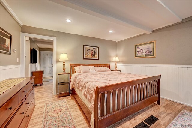 4642 Plettner Ln, Evergreen, CO 80439 - bedroom with a wainscoted wall, light wood-type flooring, recessed lighting, and beamed ceiling