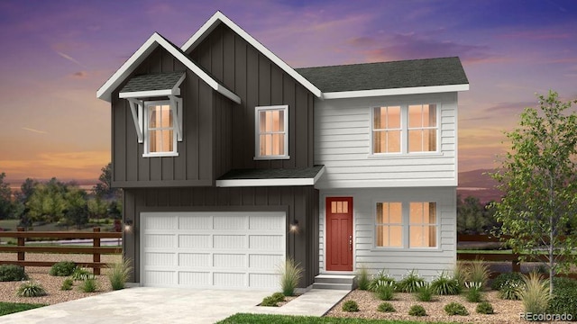 16468 W 92nd Pl, Arvada, CO 80007 - view of front of house featuring board and batten siding, an attached garage, concrete driveway, and a shingled roof