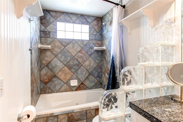 full bathroom featuring a combined bath / shower with jetted tub