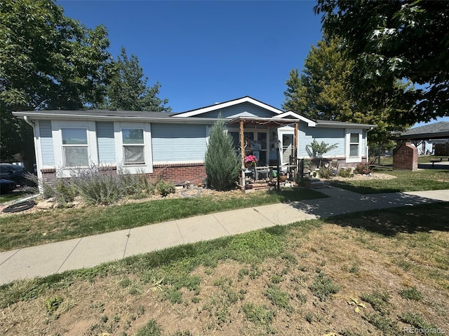 ranch-style house with a front lawn