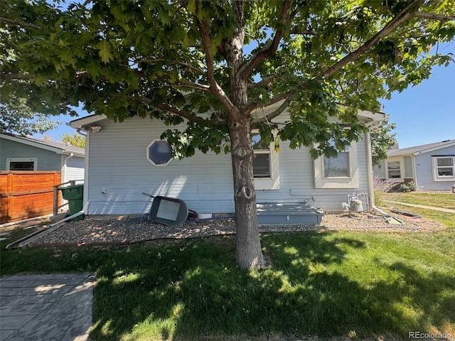 view of front of property with a front lawn