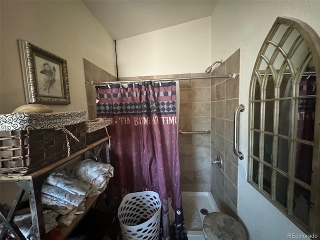 bathroom featuring a shower with curtain