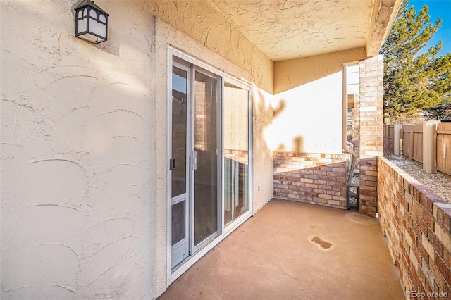 view of patio / terrace with fence