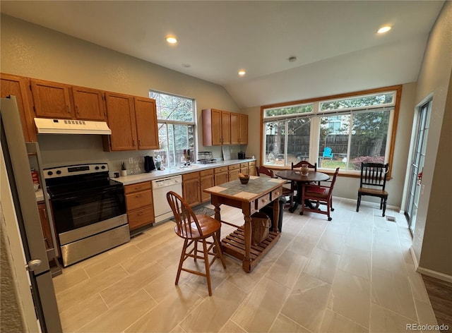 kitchen with dishwasher, light countertops, stainless steel range with electric stovetop, recessed lighting, and under cabinet range hood