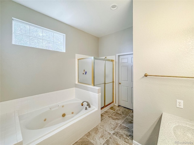 9806 Hooker Ct, Westminster, CO 80031 - full bath featuring a shower stall, a tub with jets, and vanity