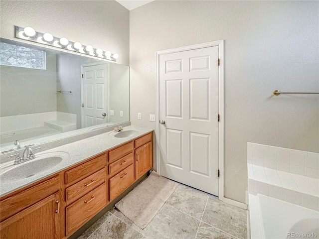 9806 Hooker Ct, Westminster, CO 80031 - full bathroom featuring a garden tub and double vanity