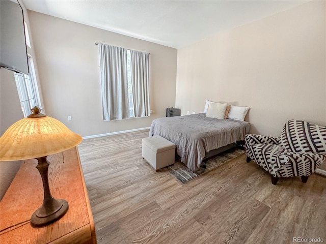 9806 Hooker Ct, Westminster, CO 80031 - bedroom with wood finished floors and baseboards
