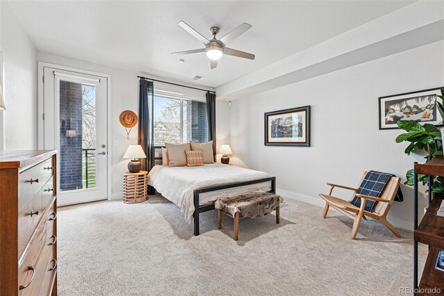bedroom with baseboards, ceiling fan, light carpet, and access to exterior