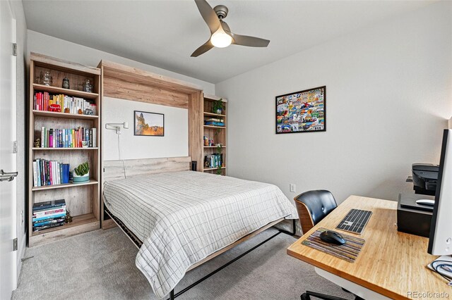 carpeted bedroom featuring a ceiling fan