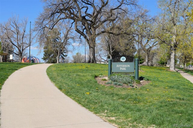 view of home's community featuring a yard