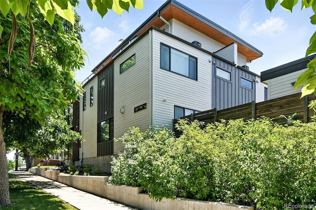 3201 W 25th Ave, Denver, CO 80211 - view of side of home with board and batten siding