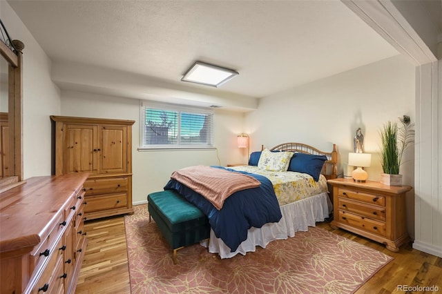 bedroom featuring light hardwood / wood-style flooring