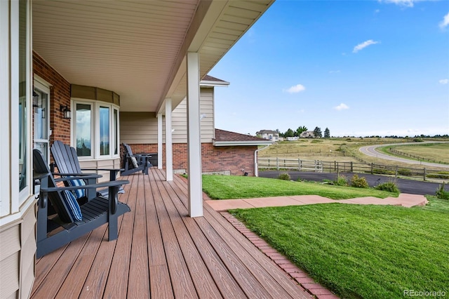 deck featuring a yard