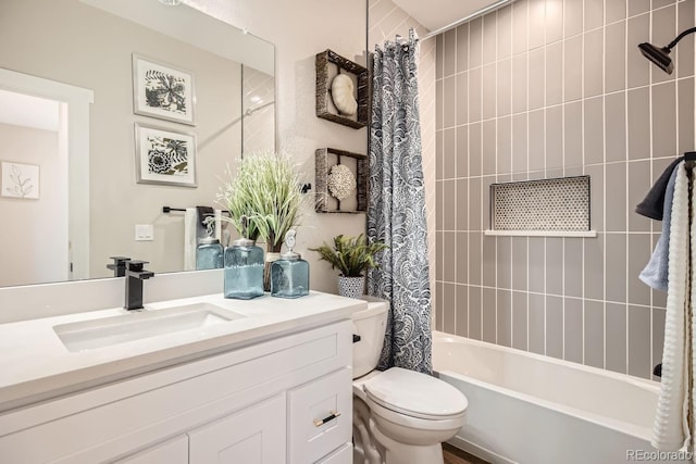 full bathroom featuring vanity, toilet, and shower / bath combo with shower curtain