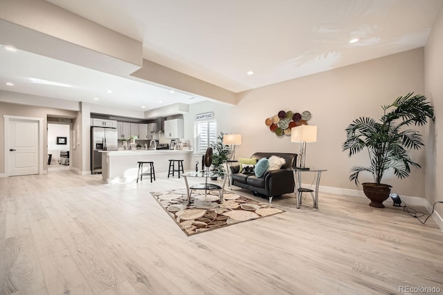 living room featuring light wood-type flooring