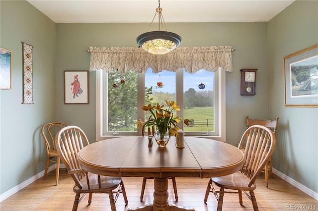 15910 Rhodes Pl, Elbert, CO 80106 - dining space with light wood finished floors and baseboards