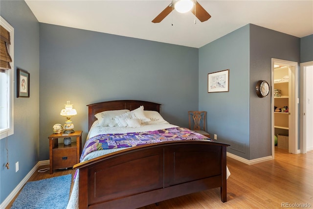 15910 Rhodes Pl, Elbert, CO 80106 - bedroom with wood finished floors, baseboards, and ceiling fan