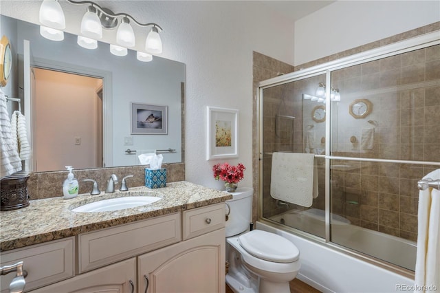 15910 Rhodes Pl, Elbert, CO 80106 - full bath with vanity, toilet, and shower / bath combination with glass door