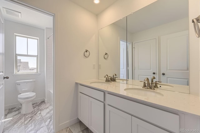 2968 S Poppy St, Morrison, CO 80465 - full bath featuring a sink, visible vents, baseboards, and toilet