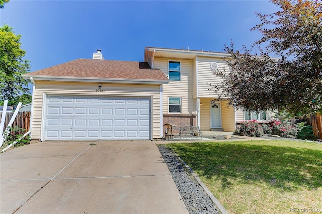 10181 Detroit Ct, Thornton, CO 80229 - view of front of home with driveway, an attached garage, a chimney, and covered porch
