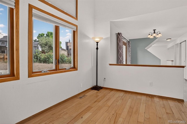 10181 Detroit Ct, Thornton, CO 80229 - spare room with a chandelier and light wood finished floors
