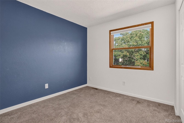 10181 Detroit Ct, Thornton, CO 80229 - spare room featuring carpet floors and a textured ceiling