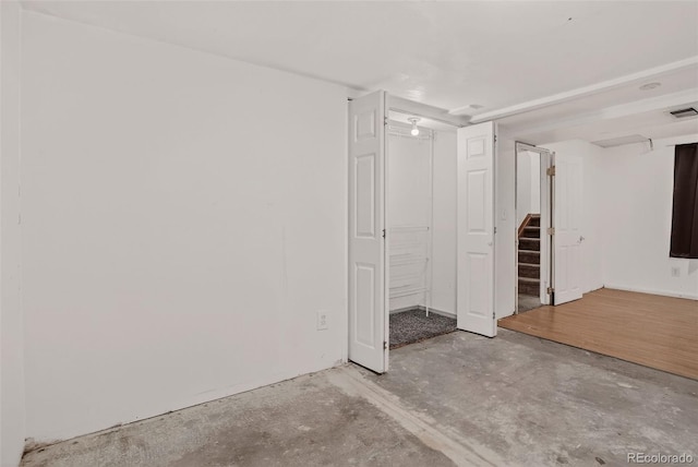 10181 Detroit Ct, Thornton, CO 80229 - spare room featuring stairs and concrete flooring