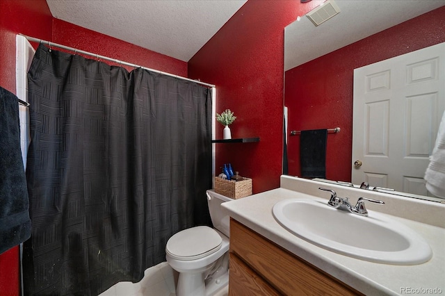 bathroom with visible vents, a textured wall, toilet, a textured ceiling, and vanity