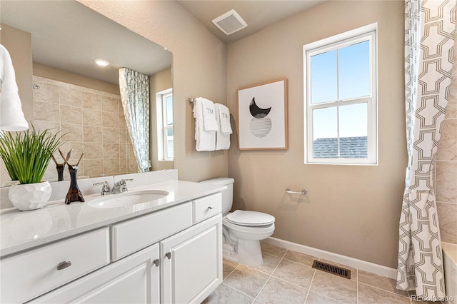 3331 N Buchanan Way, Aurora, CO 80019 - bathroom featuring toilet, visible vents, vanity, and a shower with curtain