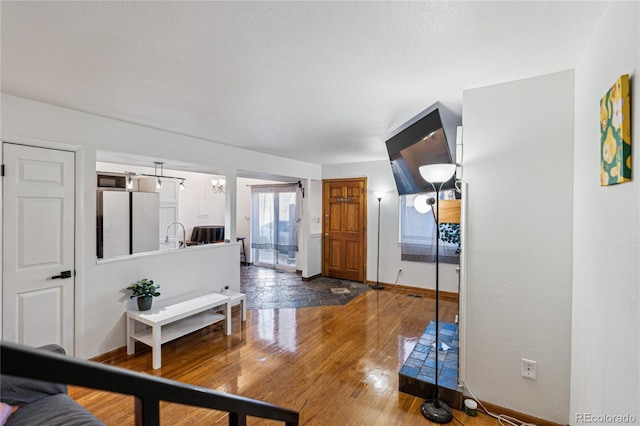 hallway featuring sink and dark hardwood / wood-style flooring