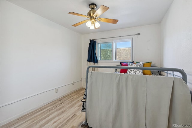 interior space featuring light wood-type flooring and ceiling fan