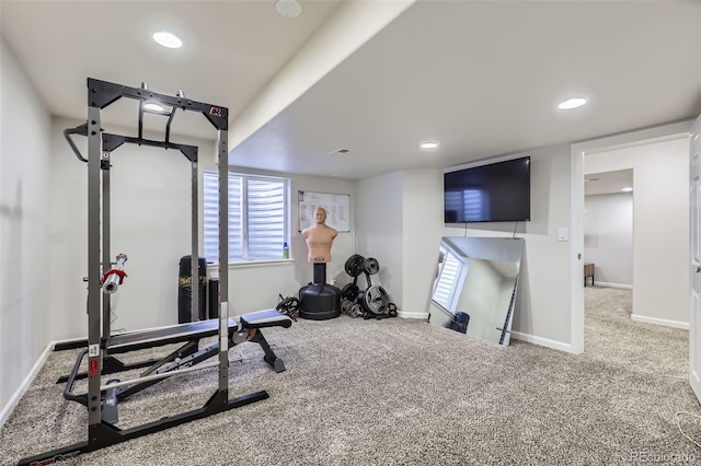 workout area featuring carpet floors