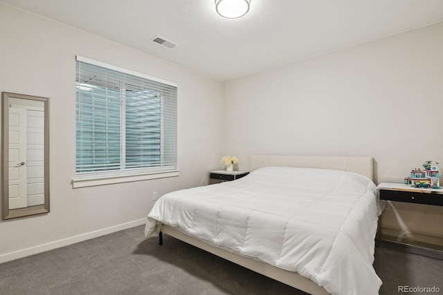 11151 W 53rd Dr, Wheat Ridge, CO 80033 - bedroom featuring baseboards and carpet flooring