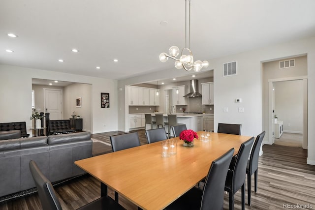 11151 W 53rd Dr, Wheat Ridge, CO 80033 - dining room with wood finished floors, recessed lighting, and a chandelier