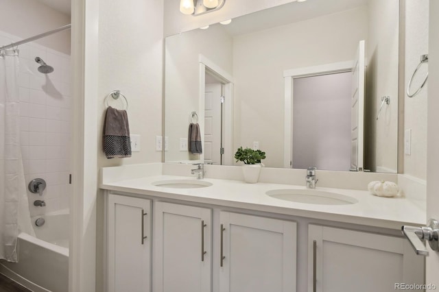 11151 W 53rd Dr, Wheat Ridge, CO 80033 - bathroom with double vanity and shower / bath combo with shower curtain