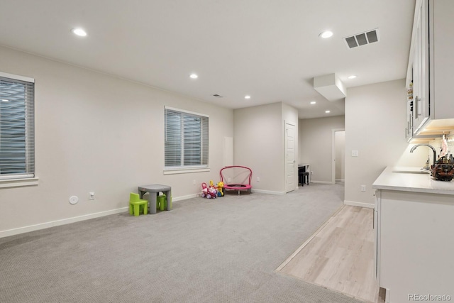 11151 W 53rd Dr, Wheat Ridge, CO 80033 - rec room featuring recessed lighting and light colored carpet