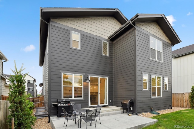 11151 W 53rd Dr, Wheat Ridge, CO 80033 - rear view of property with a patio