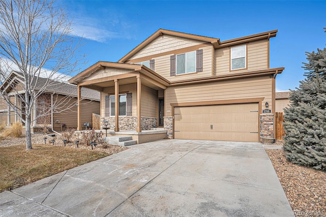 1788 Taos St, Brighton, CO 80603 - craftsman-style home with a porch, stone siding, a garage, and concrete driveway